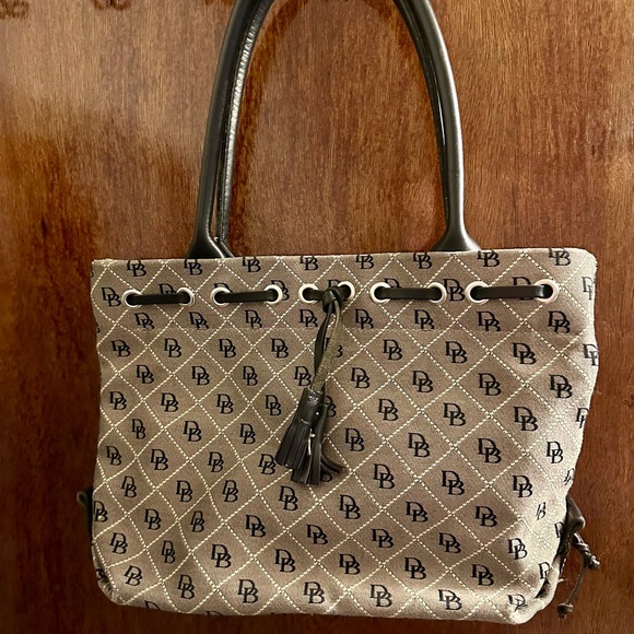 Dooney & Bourke Tan and Black Tote with Monogram Design - Picture 1 of 7